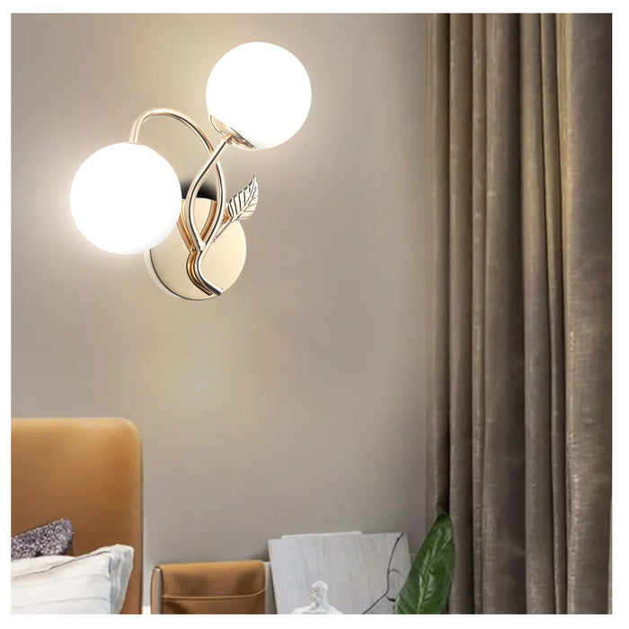 Modern Double-Globe Wall Lamp Golden Frosted Glass Light with Leaf Design